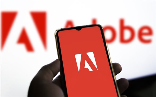 Dhaka,Bangladesh,13 May 2024:Adobe logo seen displayed on a smartphone.