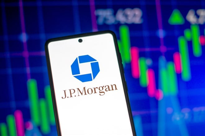 Galati, Romania - March 28, 2023: Smartphone with JP Morgan Bank logo. JP Morgan Bank stock chart on the background