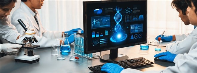 Dedicated scientist group working on advance biotechnology computer software to study or analyze DNA data after making scientific breakthrough from chemical experiment on medical laboratory. Neoteric