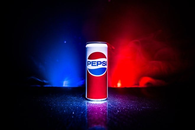 BAKU, AZERBAIJAN - APRIL 20,2019 : Pepsi can against dark toned foggy background. Pepsi is a carbonated soft drink produced by PepsiCo. - Stock Editorial Photography