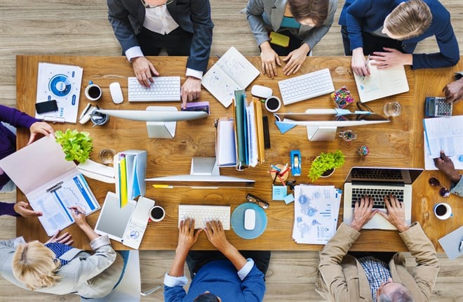 Group of People Working in an Office - stock image