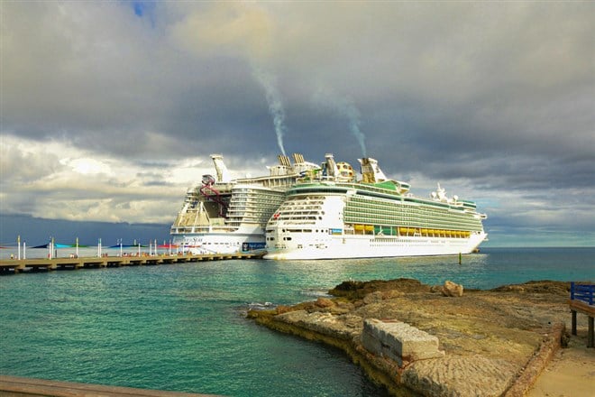 Two Luxury cruise ships of Royal Caribbean docked on port in Bahamas Image background | Two huge luxury cruise ships docked on port in Caribbean sea | Cruising, Vacation, Caribbeans, Tropical, luxury, travel, tourism concept image - Stock Editorial P