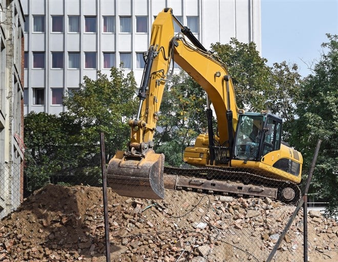 Excavator at the construction site - stock image