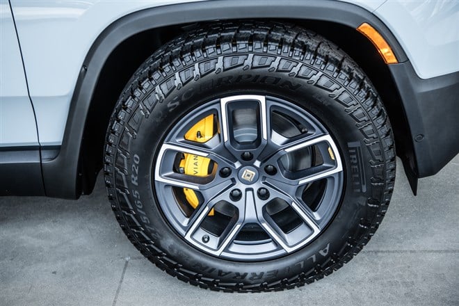 New York City, USA - August 05, 2023: Rivian R1S crossover car wheel tire disk.