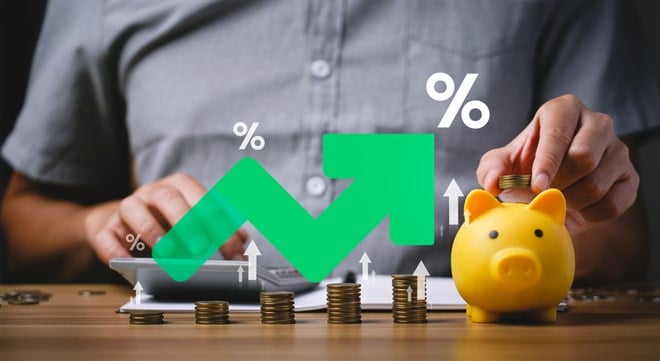 Interest rate and dividend concept, Businessman is calculating income and return on investment in percentage. income, return, retirement, compensation fund, investment, dividend tax, stock market