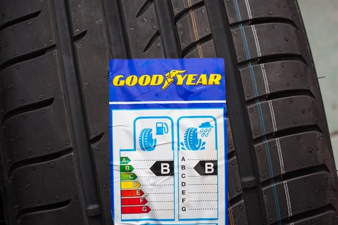 GDANSK, POLAND - MARCH 18, 2018. Brand new Goodyear car tyre with label with information about safety, fuel efficiency and external tyre noise. The Goodyear is an American multinational tire manufacturing company. — Stock Editorial Photography