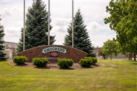 Smucker logo in front of building