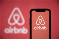 Is Airbnb a buy on fee increase, international growth?