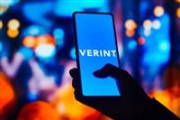 Verint Systems logo is displayed on a smartphone screen