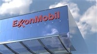 ExxonMobil logo sign on glass building