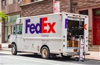 FedEx logo on delivery truck