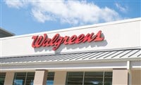 Ocala, Florida 4-9-2024 Walgreens Drug Store red logo, signage, facade exterior entrance with blue sky and clouds background. Walgreens is an American company that operates a pharmacy store chain.
