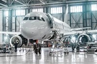 Passenger aircraft on maintenance of engine and fuselage repair in airport hangar