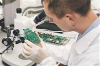 Microchip production factory. Computer expert. Manufacturing. Engineering. Chip. Professional. Technician.