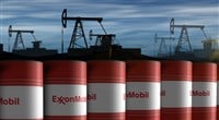 Poznan, Poland, May 12, 2024: ExxonMobile oil fuel and gas barrels in row concept. Exxon Mobile company and petrol industrial containers 3d illustration.