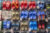 A large variety of Crocs on display in a Siam Paragon Mall in Bangkok, Thailand