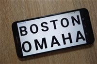 Boston Omaha logo displayed on smartphone