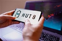 In this photo illustration, the Hut 8 Mining logo seen displayed on a smartphone screen