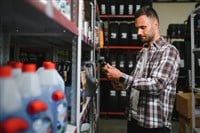 person shopping in auto parts store