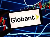 Globant logo on smartphone with stock market background