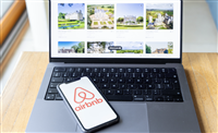 Paris, France - November 30, 2023 :smartphone with Airbnb application. Airbnb is an online marketplace and hospitality service, enabling people to lease or rent short-term lodging — Stock Editorial Photography