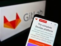 STUTTGART, GERMANY - Mar 03, 2021: Mobile phone with company website of American DevOps platform GitLab Inc. on screen in front of logo. Focus on center of cellphone display. - Stock Editorial Photography