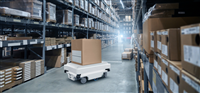 Mobile robot transporting a box in a warehouse. Concept - stock image