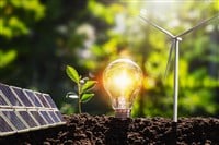 Concept idea clean energy in nature. lightbulb with solar panel - stock image