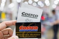 Black membership card and receipt in Costco wholesale store