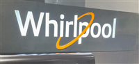 HUDSON, WI, USA - AUGUST 11, 2022: Whirlpool retail store appliance display and trademark logo. - Stock Editorial Photography