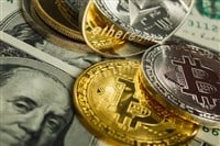 Bitcoin coin with other cryptocurrency on dollar notes - Stock Editorial Photography