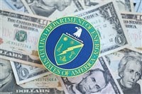 KYIV, UKRAINE - MARCH 9, 2024 US Department of Energy seal on many US dollar bills close up