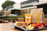 Lviv, Ukraine - October 9, 2023: McDonald's menu on wooden table outdoors, space for text — Photo