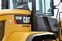 Caterpillar heavy duty equipment vehicle and logo - Stock Editorial Photography