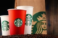 Composition with cup of Starbucks coffee — Stock Editorial Photography