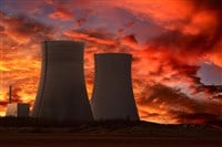 Nuclear power plant with an intense red sky — Photo