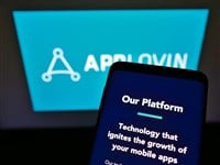 AppLovin logo smartphone and computer screen