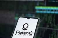 Palantir company logo on the screen of smartphone, finger touching it and the blurred Palantir logo on the background.