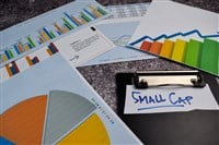 Small Cap write on sticky notes isolated on Office Desk. Stock market concept