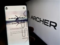 Stuttgart, Germany - 09-11-2023: Person holding mobile phone with web page of US eVTOL aircraft company Archer Aviation Inc. on screen with logo. Focus on center of phone display. — Stock Editorial Photography