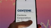 April 09th 2024 , St. Louis, Missouri. Close up on logo of Centene Corporation on the screen of an exchange. Centene Corporation price stocks, $CNC on a device. — Stock Editorial Photography