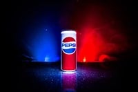 BAKU, AZERBAIJAN - APRIL 20,2019 : Pepsi can against dark toned foggy background. Pepsi is a carbonated soft drink produced by PepsiCo. - Stock Editorial Photography