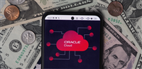 Bavaria, Germany - January 8, 2024: In this photo illustration, a Oracle Cloud logo seen displayed on a smartphone with United States Dollar notes and coins in the background. — Stock Editorial Photography