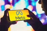 June 1, 2022, Brazil. In this photo illustration, a silhouetted woman holds a smartphone with the Meta Platforms, Inc. logo displayed on the screen