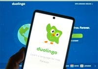 Montreal, Canada - March 08, 2020: Duolingo logo and application on a cellphone. Duolingo is a platform that includes a language-learning website and mobile application.