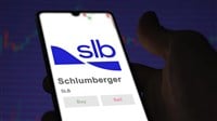 April 09th 2024 , Houston, Texas. Close up on logo of Schlumberger on the screen of an exchange. Schlumberger price stocks, $SLB on a device. — Stock Editorial Photography