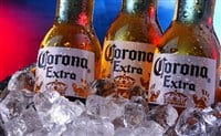 Bottles of Corona Extra beer in the bucket with crushed ice — Stock Editorial Photography