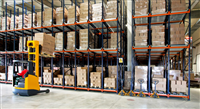 Photo of a forklifter in a warehouse