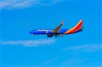 Los Angeles, California - January 6, 2025: Southwest Airlines Plane in Flight Against Clear Blue Sky — Stock Editorial Photography