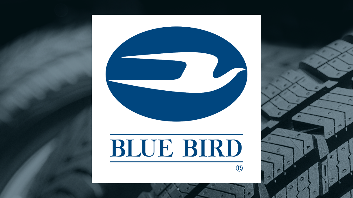 Blue Bird logo with Auto/Tires/Trucks background